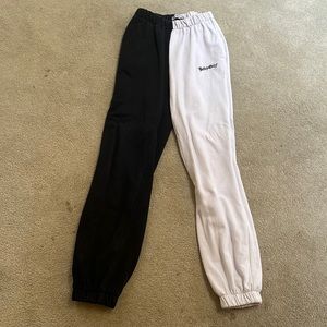 Adika black and white half half sweatshirts selling for $17 size XS WOMENS